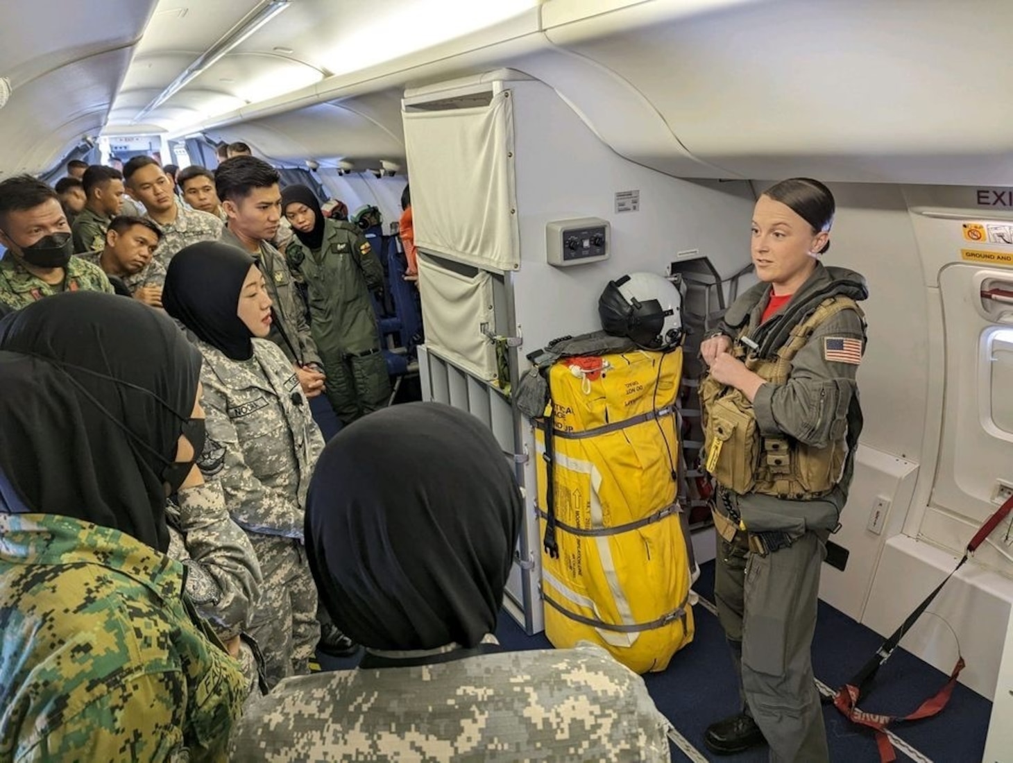 RIMBA AIR BASE, Brunei (Oct. 25, 2022) –  Naval Aircrewman (Operator) 1st Class Chelsea Mitchell, assigned to the “Red Lancers” of Patrol Squadron (VP) 10, conducts training for members of the Royal Brunei Armed Forces during Cooperation Afloat Readiness and Training Brunei 2022. VP-10 is currently operating from Kadena Air Base in Okinawa, Japan. The squadron conducts maritime patrol and reconnaissance, as well as theater outreach operations, as part of a rotational deployment to the U.S. 7th Fleet area of operations. (U.S. Navy photo by Aviation Electrician’s Mate 1st Class Brian Woodford) (U.S. Navy photo by Aviation Electrician’s Mate 1st Class Brian Woodford)