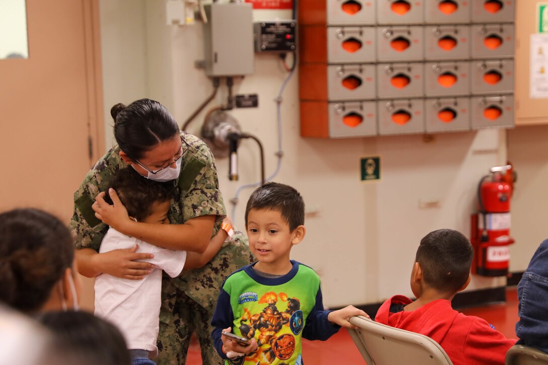 PUERTO CORTES, Honduras (Nov. 6, 2022) A Sailor assigned to the hospital ship USNS Comfort (T- AH 20), conducts a patient roll call before checking the patients out, Nov. 6, 2022.