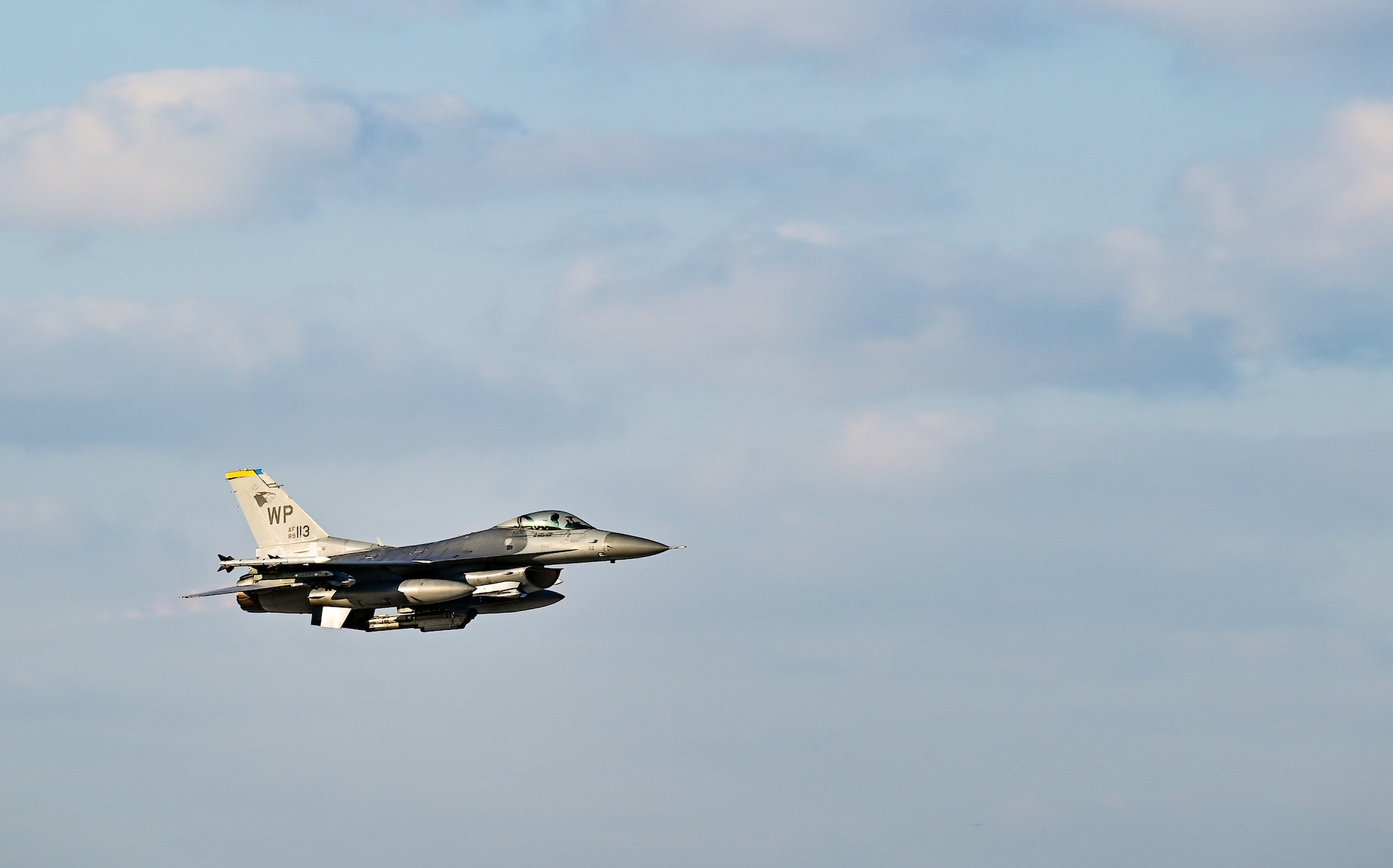 An F-16 Fighting Falcon assigned to the 80th Fighter Squadron takes off at Kunsan Air Base, Republic of Korea, Nov. 4, 2022. Kunsan expediently launched 16 jets in one go as a part of a Pacific Air Forces annual command sponsored Combined Flying Training Event, showcasing their ability to be ready to fight tonight. The training event allowed fourth and fifth-generation fighters to practice offensive and defensive tactics. (U.S. Air Force photo by Staff Sgt. Sadie Colbert)