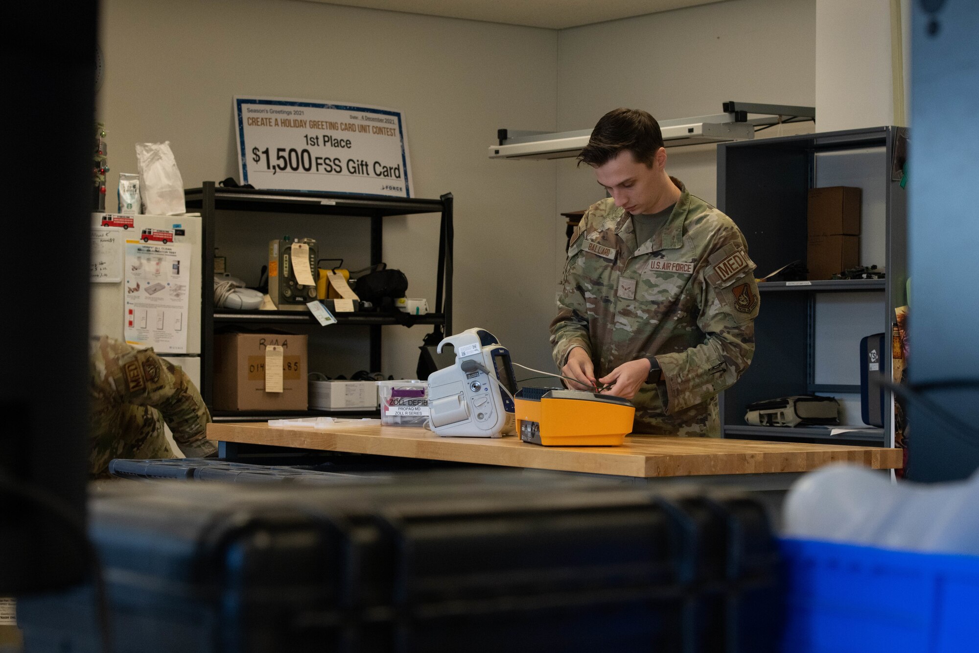 An Airman prepares to test medical equipment.