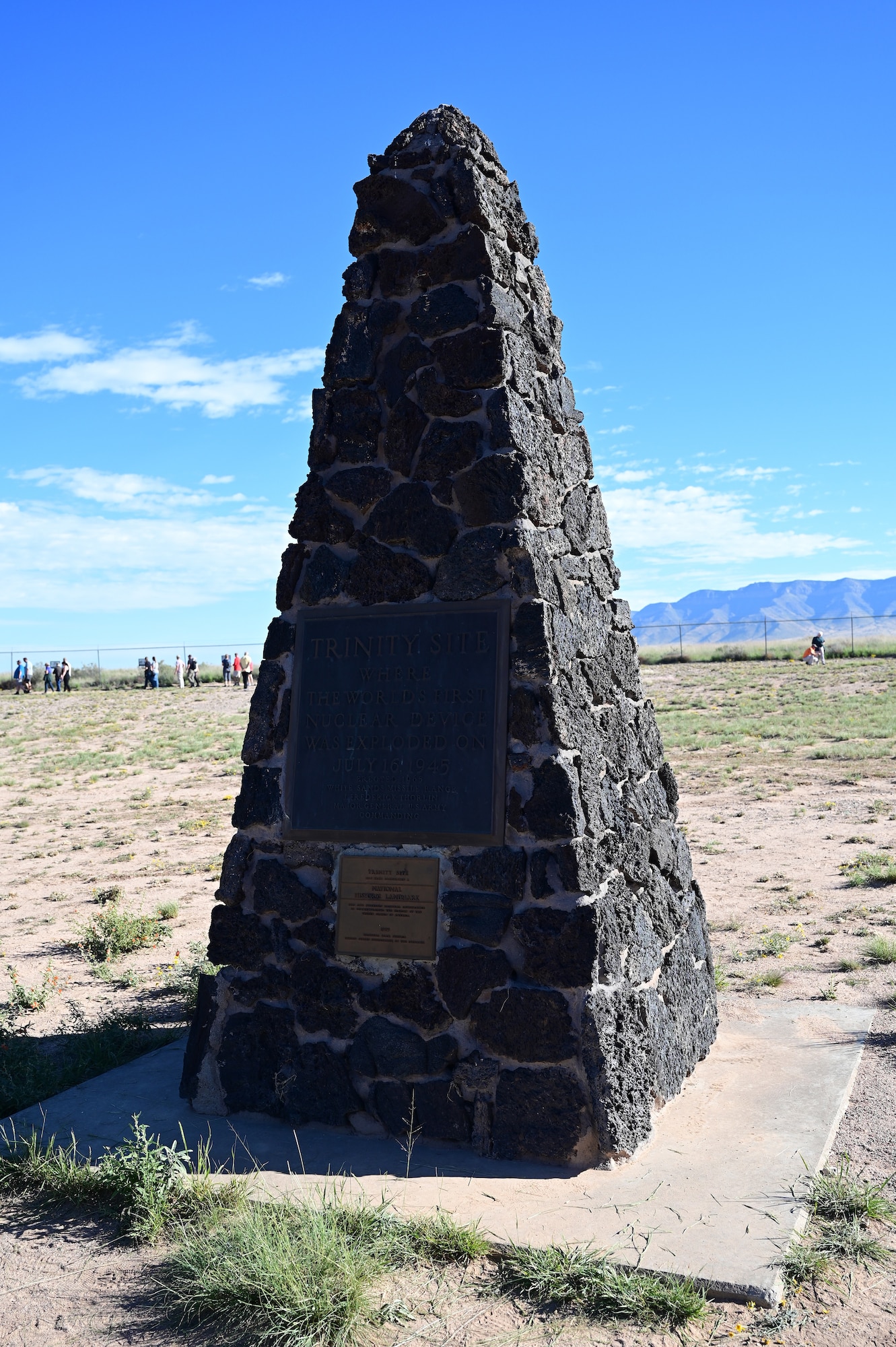 A lavastone obelisk marks the site of Ground Zero for the first nuclear detonation, conducted July 16, 1945, on the White Sands Missile Range, New Mexico.

The Trinity Site is open to the public twice a year and personnel are on hand to educate visitors about the Manhattan Project and the beginning of the atomic age. (U. S. Air Force photo by Glenn S. Robertson)