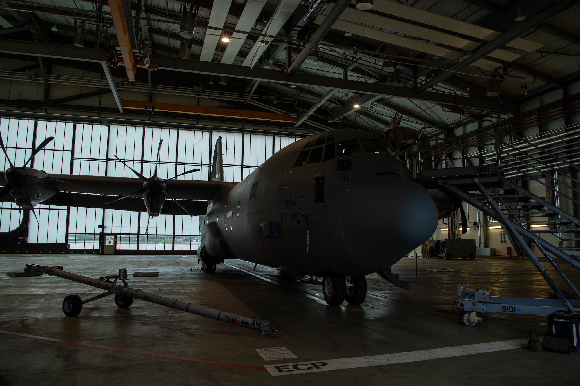 U.S. Air Force Airmen from the 86th Aircraft Maintenance Squadron make repairs to a C-130J Super Hercules aircraft at Ramstein Air Base, Germany, Nov. 7, 2022.