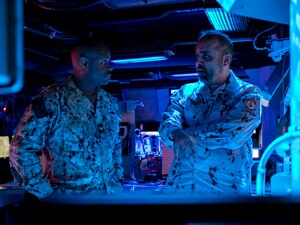 221105-N-UL352-1074 ARABIAN GULF (Nov. 5, 2022) Capt. Anthony Webber, deputy commander of Destroyer Squadron 50, left, speaks with a member of the United Arab Emirates armed forces aboard guided-missile destroyer USS Delbert D. Black (DDG 119) during exercise Nautical Defender in the Arabian Gulf, Nov. 5. The multilateral training event involved U.S. Naval Forces Central Command, Royal Saudi Navy’s Eastern Fleet and UK’s Royal Navy, with observers from several regional countries.
