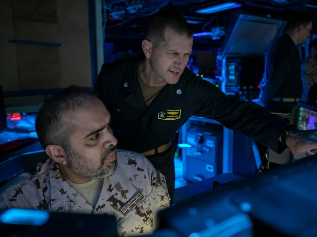 221105-N-UL352-1140 ARABIAN GULF (Nov. 5, 2022) Cmdr. Adam Stein, commanding officer of guided-missile destroyer USS Delbert D. Black (DDG 119), speaks with a member of the United Arab Emirates armed forces during exercise Nautical Defender in the Arabian Gulf, Nov. 5. The multilateral training event involved U.S. Naval Forces Central Command, Royal Saudi Navy’s Eastern Fleet and UK’s Royal Navy, with observers from several regional countries.