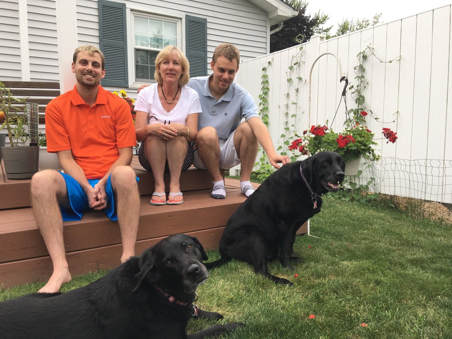 Family photo with 2 dogs