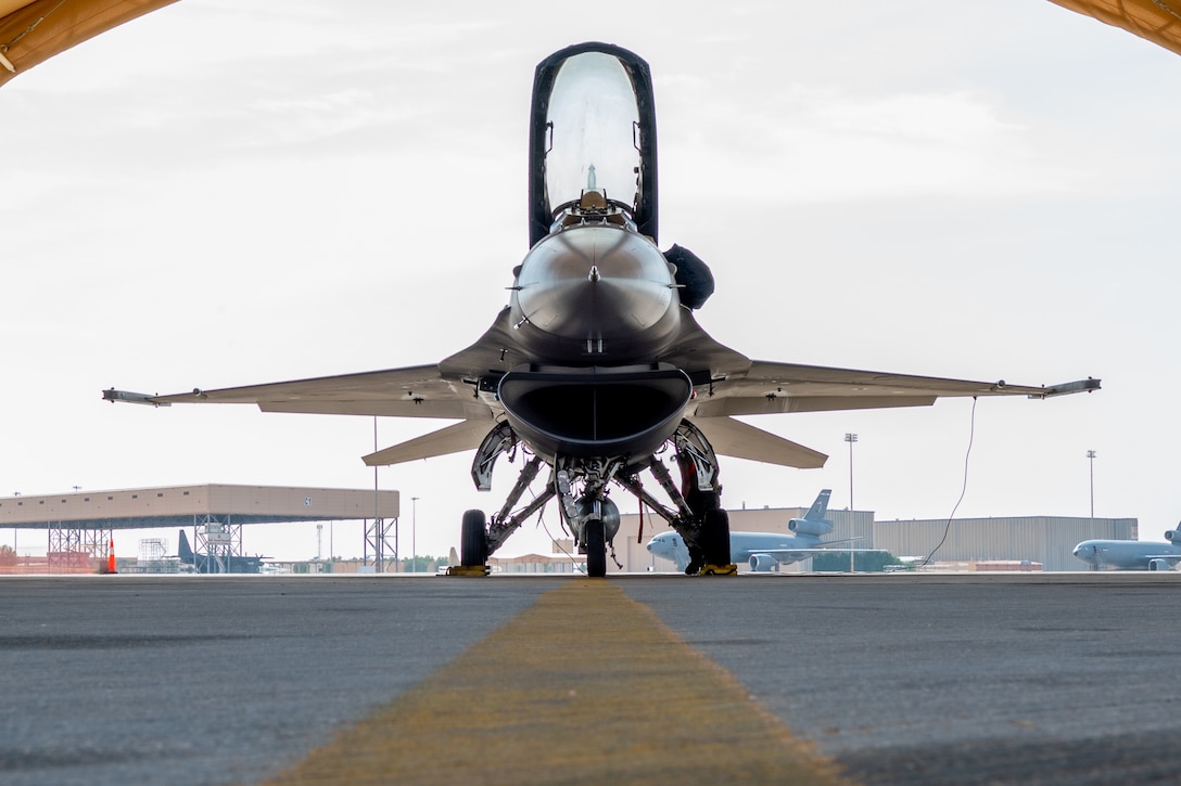 U.S. Air Force Capt. Christopher Hartman, a pilot assigned to the 77th Expeditionary Fighter Squadron, conducts pre-flight systems checks in the cockpit of an F-16 Fighting Falcon aircraft prior to departure for the Bahrain International Airshow (BAIS) 22, from Prince Sultan Air Base, Kingdom of Saudi Arabia, Nov. 6, 2022.  BAIS, a biennial event, is an opportunity to strengthen military-to-military relationships with regional partners and promote U.S. national security objectives in the U.S. Central Command area of responsibility. (U.S. Air Force photo by SSgt. Shannon Bowman)