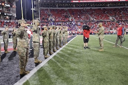 Maj. Gen. Michel M. Russell Sr. reenlists Soldiers