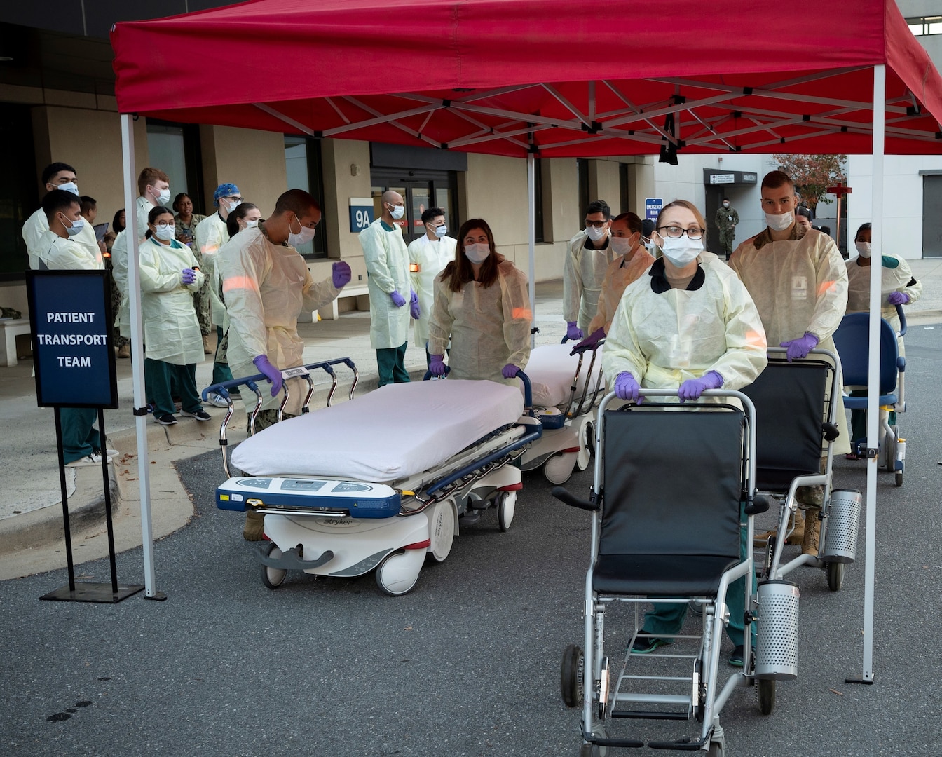 The patient transport team at Walter Reed National Military Medical Center (WRNMMC) awaits mock mass casualties during a Code Green exercise at WRNMMC in Bethesda, Maryland, November 3, 2022.