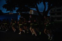 U.S. service members with Headquarters Battalion, Marine Corps Base Hawaii, run in formation during a motivational run, MCBH, Nov. 3, 2022. The purpose of the run was to enhance unit morale, increase physical and mental fitness, and to commemorate the 247th Marine Corps Birthday. (U.S. Marine Corps photo by Lance Cpl. Terry Stennett III)
