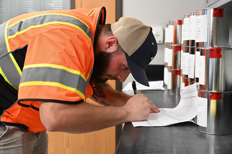 U.S. Army Corps of Engineers contractor documents delivery of soil samples collected at Jana Elementary School to the Formerly Utilized Sites Remedial Action Program labs for chain of custody (US Army Photo by JP Rebello)