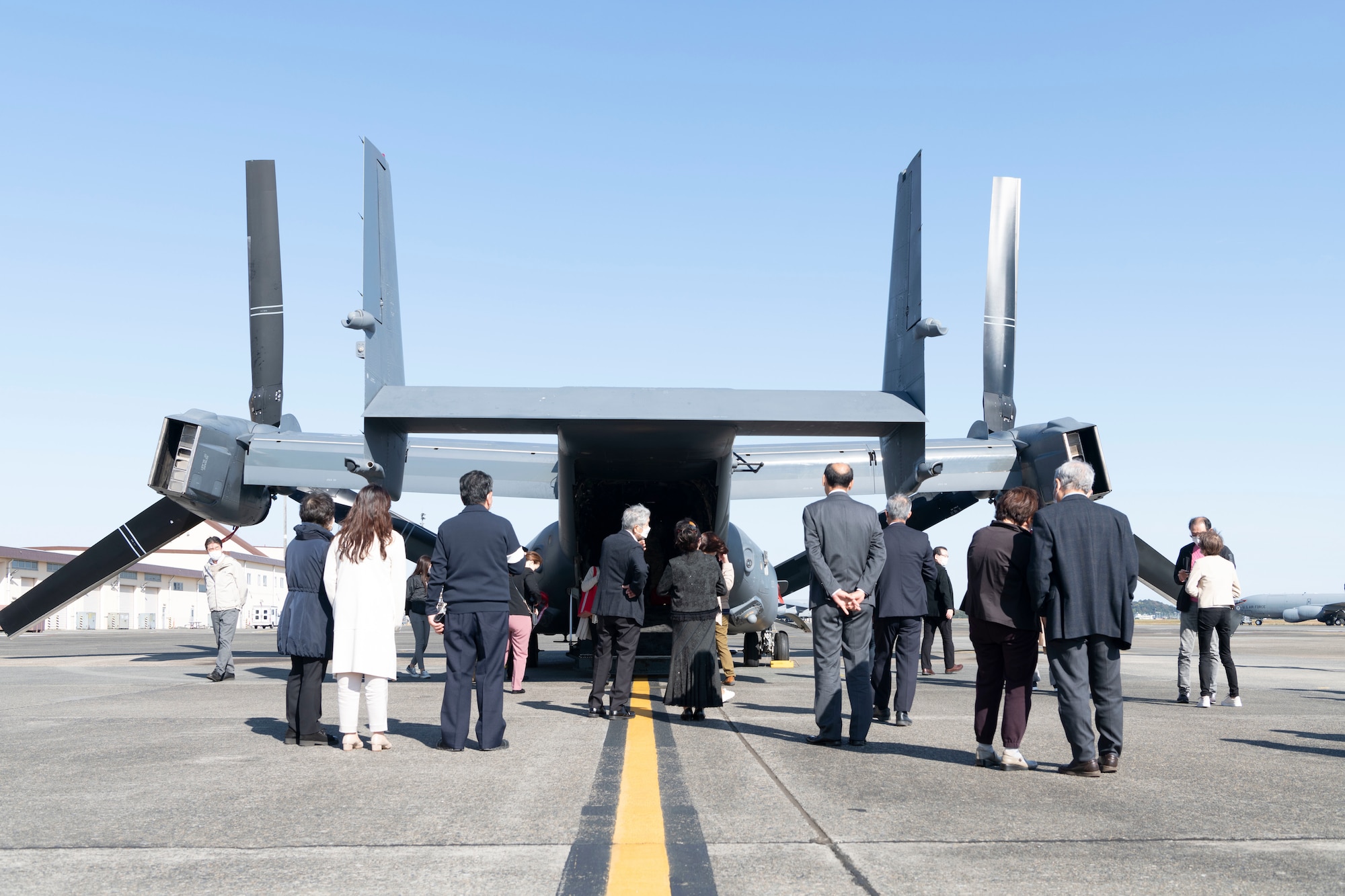Members of the Akishima-Yokota Friendship Club tour a CV-22 Osprey during a base immersion tour hosted by the 374th Mission Support Group at Yokota Air Base, Japan, Nov. 4, 2022.