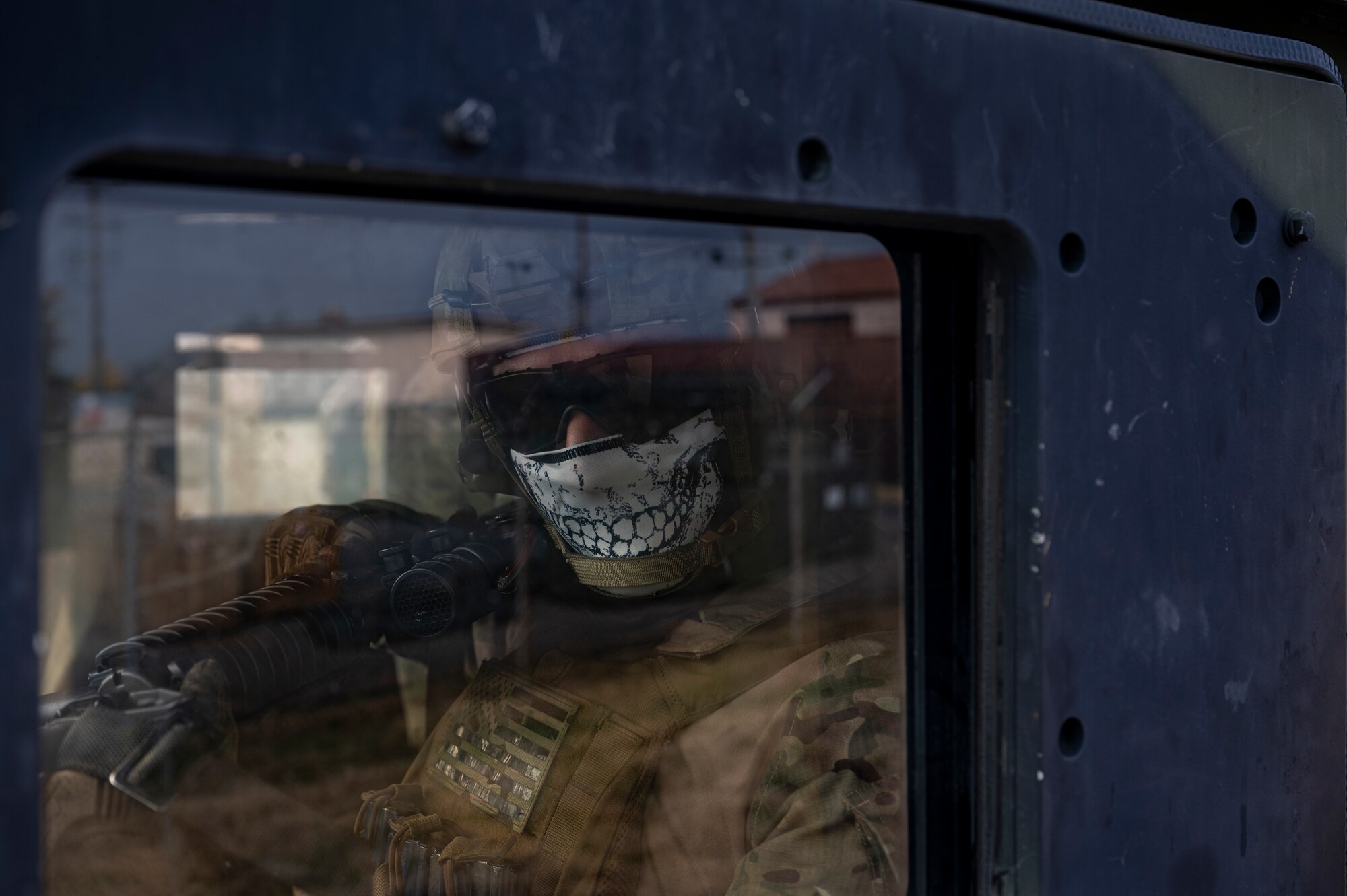 U.S. Air Force Senior Airman Brice Champion, 51st Security Forces Squadron combat arms instructor, secures a Humvee’s driver-side during a joint Combat Readiness Course (CRC) with Republic of Korea Military Police members Osan Air Base, ROK, Nov. 3, 2022.