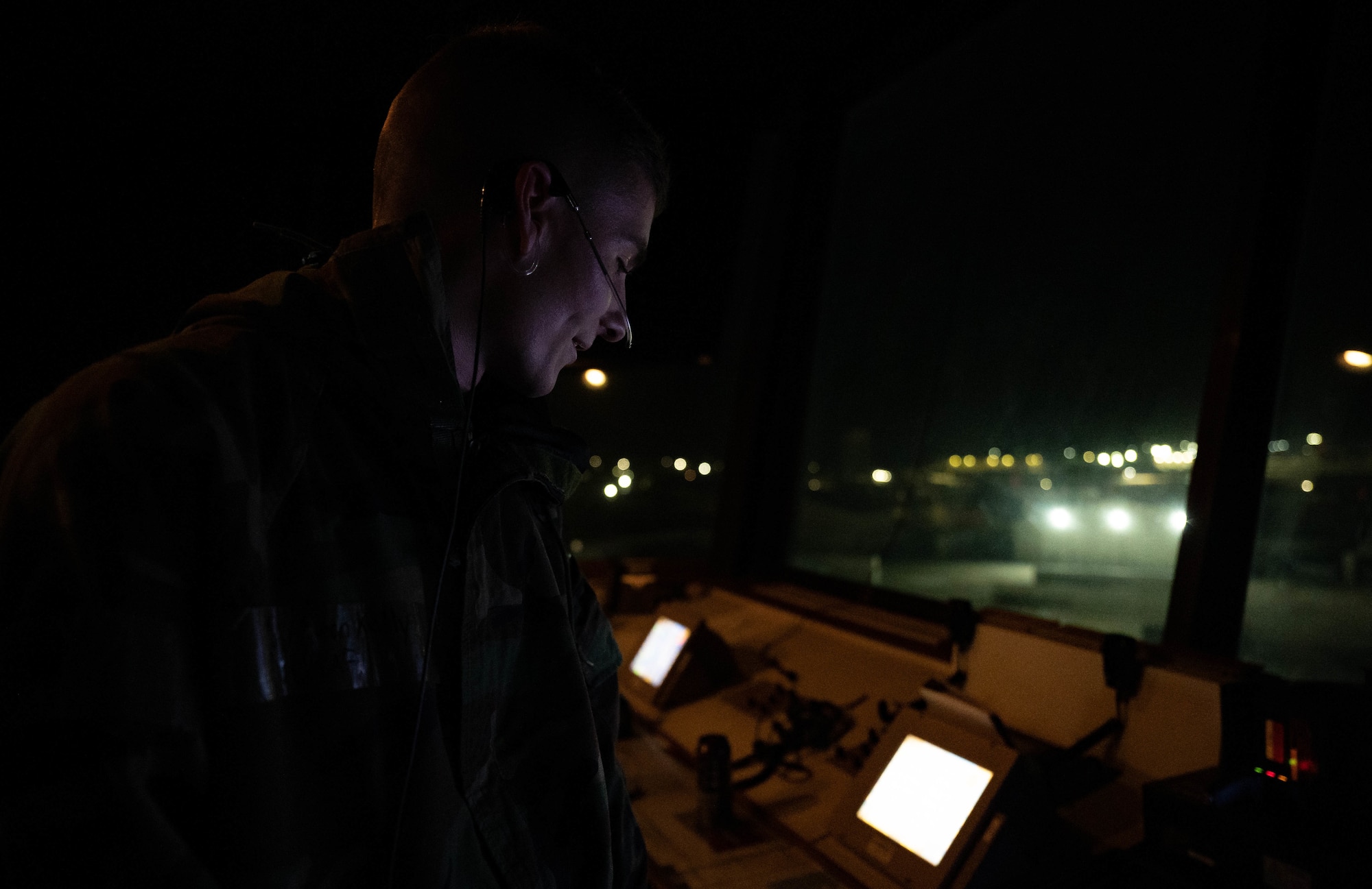 U.S. Air Force Senior Airman Shawn Kelly, 8th Operations Support Squadron air traffic controller, monitors a terminal at Kunsan Air Base, Republic of Korea, Nov. 3, 2022. Air traffic controllers are responsible for monitoring and directing all aspects of flight within the Kunsan AB airspace. (U.S. Air Force photo by Senior Airman Shannon Braaten)