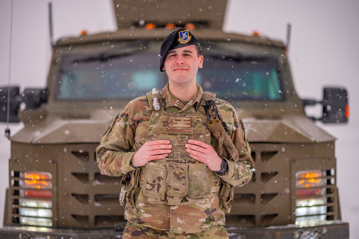 Airman 1st Class Connor Crawn, 341st Missile Security Operations Squadron convoy team leader, stands in front of a ballistic engineered armored response counterattack truck on a
flightline at Malmstrom Air Force Base, Mont., Nov. 8, 2022. Crawn, member of the Kanien;kehà:ka Tribe, went against his faith and cut his hair to join the Air Force in 2021. After
nearly two years after requesting a religious accommodation to grow his hair long again, Crawn was granted approval in October. (U.S. Air Force photo by Airman 1st Class Mary A. Bowers)