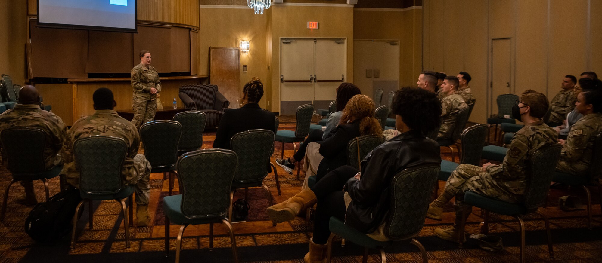 U.S. Air Force Maj. Justine Wells, 35th Surgical Operations Squadron labor and delivery element leader, speaks to the crowd during a Story Tellers event at Misawa Air Base, Japan, Oct. 19, 2022.