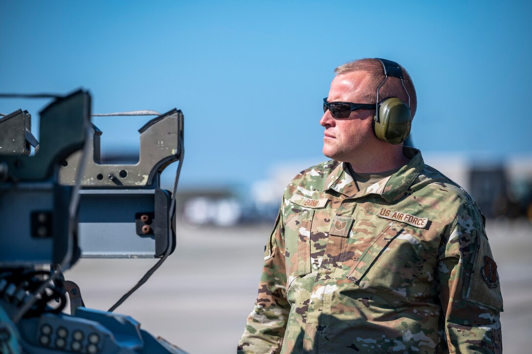 Airmen observes a missile cart