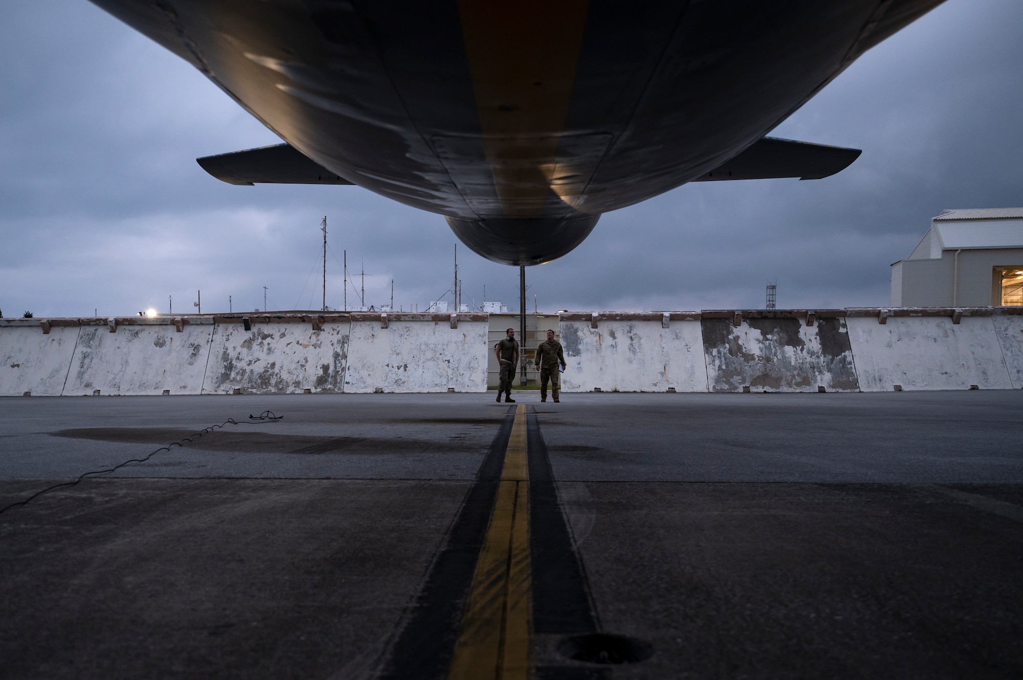 U.S. Air Force personnel assigned to the 909th Air Refueling Squadron and the 718th Aircraft Maintenance Squadron conduct pre-flight checks prior to a refueling flight at Kadena Air Base, Japan, Nov. 4, 2022. The 909th ARS is the premiere force for aerial refueling operations in the Indo-Pacific theater, supporting U.S. forces and regional allies and partners. (U.S. Air Force photo by Senior Airman Jessi Roth)