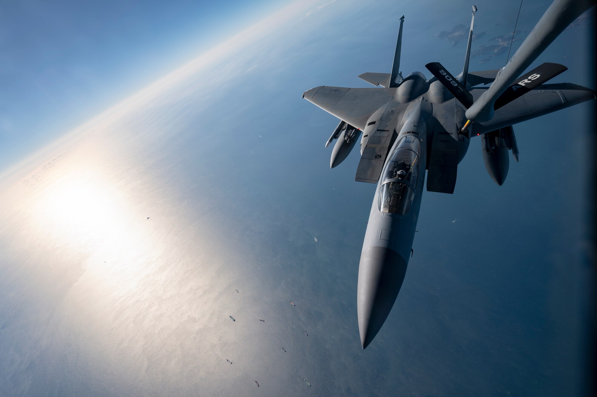 A U.S. Air Force 44th Fighter Squadron F-15C Eagle receives fuel from a 909th Air Refueling Squadron KC-135 Stratotanker over South Korea, Nov. 4, 2022. The Eagle's air superiority was achieved through a mixture of unprecedented maneuverability and acceleration, range, weapons and avionics. (U.S. Air Force photo by Senior Airman Jessi Roth)