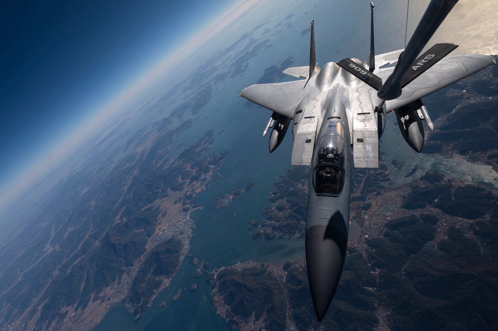 A U.S. Air Force 44th Fighter Squadron F-15C Eagle receives fuel from a 909th Air Refueling Squadron KC-135 Stratotanker over South Korea, Nov. 4, 2022. Kadena received its first F-15 C's in 1979. Since then, the tactical fighter has provided unmatched air superiority for the Indo-Pacific region. (U.S. Air Force photo by Senior Airman Jessi Roth)