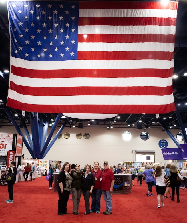 Some Heroes Wear Quilts: Army Reserve Soldier recognized by Quilts of Valor during International Quilting Festival