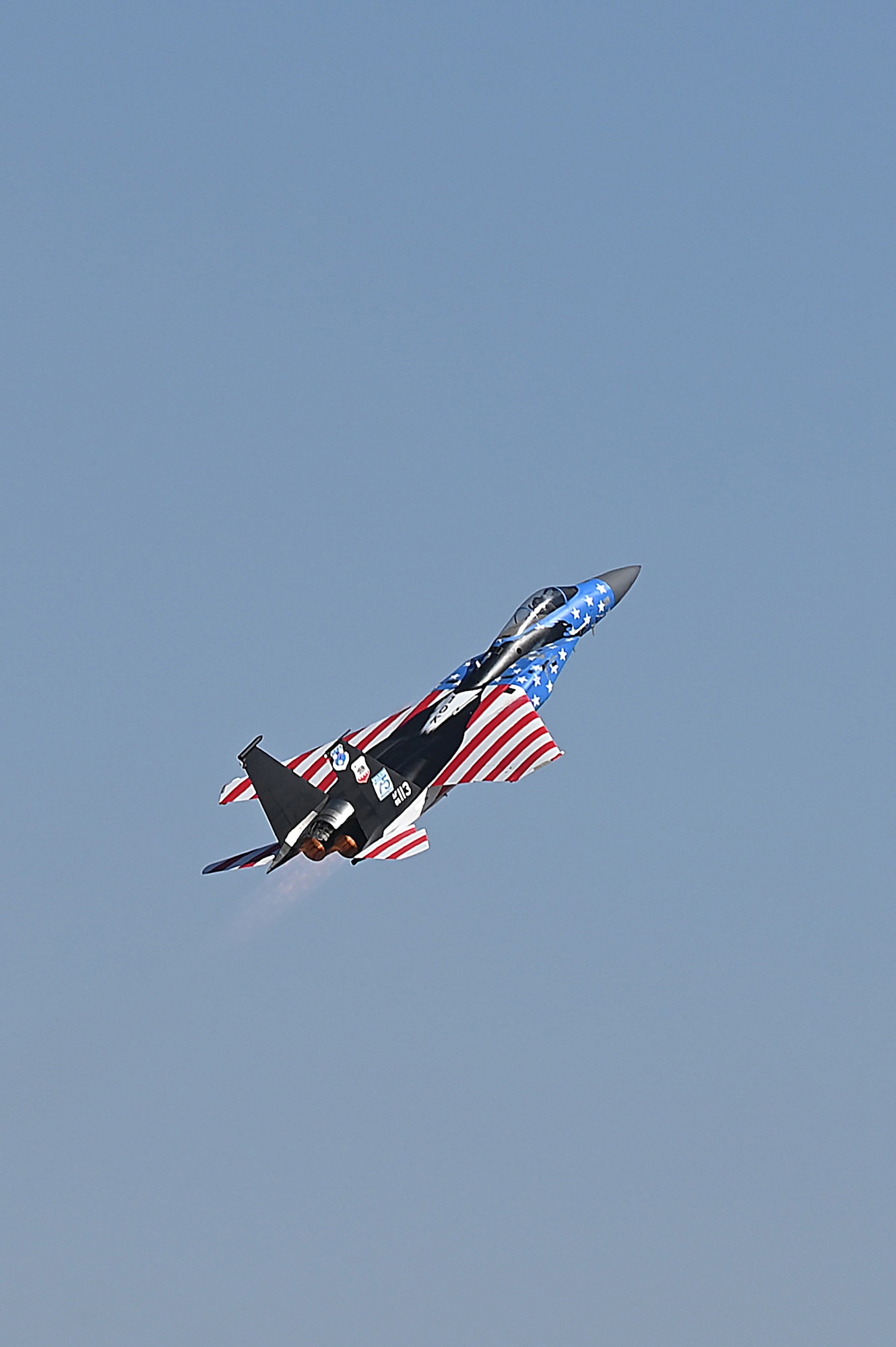 A F-15C Eagle from the 144th Fighter Wing performs a functional flight test for the first time after receiving an American flag paint scheme Oct. 21, 2022, at the Fresno Air National Guard Base, Calif. Members of the 144th Maintenance Structural shop painted the aircraft after it reached 10,000 flight hours. (U.S. Air National Guard photo by Master Sgt. Charles Vaughn)