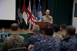 MANAMA, Bahrain (Nov. 8, 2022) United Kingdom Royal Navy Commodore Ben Aldous, commander of International Maritime Security Construct (IMSC) and Coalition Task Force Sentinel, speaks to military and industry representatives during IMSC’s biannual stakeholders conference in Bahrain, Nov. 8. The half-day conference included speakers and panelists who presented topics on maritime security, coalition and industry partnerships, and innovation.