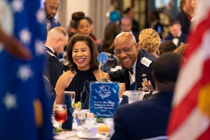 Air Force Chief of Staff Gen. CQ Brown, Jr. laughs with his wife,Sharene Brown, at the 75th Anniversary Air Force Ball hosted at Joint Base Anacostia-Bolling, Washington, D.C., Sept. 9, 2022. The night included dinner, dancing, raffle prizes, and a performance by The United States Air Force Strings. (U.S. Air Force photo by Airman Bill Guilliam)
