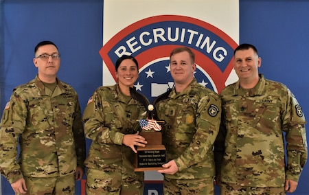 Soldiers Pose with trophy