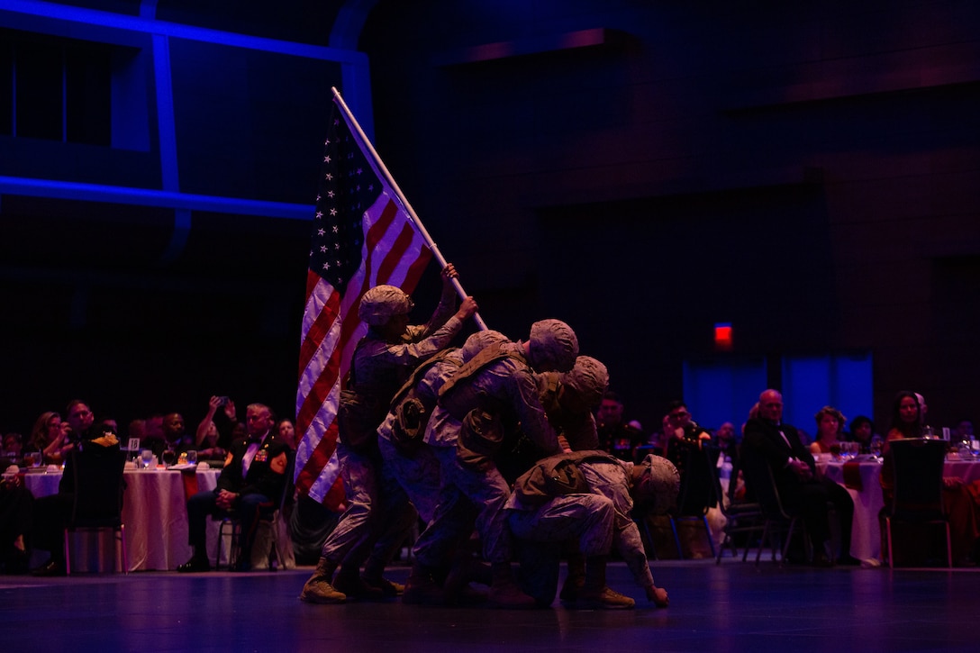 U.S. Marines with Marine Corps Intelligence School Marine Detachment, participate in a historical uniform pageant during the Fleet Marine Force, Atlantic (FMFLANT), Marine Forces Command (MARFORCOM), Marine Forces Northern Command (MARFOR NORTHCOM) 247th Marine Corps Birthday Ball hosted at the Virginia Beach Convention Center, Norfolk, Va., Nov. 2, 2022. Due to the COVID-19 pandemic, the service members of FMFLANT, MARFORCOM, MARFOR NORTHCOM have not celebrated the Marine Corps Birthday Ball since 2019. The birthday ball is a celebration of Marine Corps tradition and the legacy across generations from the past to the future of the warfighting organization. (U.S. Marine Corps photo by Lance Cpl. Angel Alvarado)