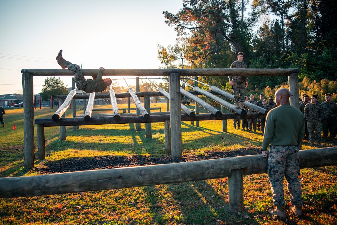 U.S. Marines with Headquarters Company, Headquarters Battalion, 2d Marine Division, conduct physical training on Camp Lejeune, North Carolina, Nov. 8, 2022.