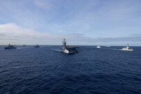 The first-in-class aircraft carrier USS Gerald R. Ford (CVN 78) steams in the Atlantic Ocean in formation with the German frigate FGS Hessen (F 221), Ticonderoga-class guided-missile cruiser USS Normandy (CG 60), Danish frigate HDMS Peter Willemoes (FFH 362), Canadian frigate HMCS Montreal (FFH 336), Arleigh Burke-class guided-missile destroyer USS Thomas Hudner (DDG 116), Spanish Armada frigate Álvaro de Bazán (F 101), Dutch frigate HNLMS De Zeven Provincien (F 802), French frigate FS Chevalier Paul (D 621), Dutch frigate HNLMS Van Amstel (F 831) and Arleigh Burke-class guided-missile destroyer USS McFaul (DDG 74), Nov. 7, 2022. Exercise Silent Wolverine is a U.S.-led, combined training exercise that tests Ford-class aircraft carrier capabilities through integrated high-end naval warfare scenarios alongside participating allies in the Eastern Atlantic Ocean. The Gerald R. Ford Carrier Strike Group is conducting their first deployment in the U.S. Naval Forces Europe area of operations. (U.S. Navy photo by Mass Communication Specialist 3rd Class Jacob Mattingly)