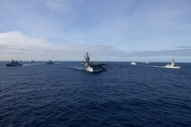 The first-in-class aircraft carrier USS Gerald R. Ford (CVN 78) steams in the Atlantic Ocean in formation with the German frigate FGS Hessen (F 221), Ticonderoga-class guided-missile cruiser USS Normandy (CG 60), Danish frigate HDMS Peter Willemoes (FFH 362), Canadian frigate HMCS Montreal (FFH 336), Arleigh Burke-class guided-missile destroyer USS Thomas Hudner (DDG 116), Spanish Armada frigate Álvaro de Bazán (F 101), Dutch frigate HNLMS De Zeven Provincien (F 802), French frigate FS Chevalier Paul (D 621), Dutch frigate HNLMS Van Amstel (F 831) and Arleigh Burke-class guided-missile destroyer USS McFaul (DDG 74), Nov. 7, 2022. Exercise Silent Wolverine is a U.S.-led, combined training exercise that tests Ford-class aircraft carrier capabilities through integrated high-end naval warfare scenarios alongside participating allies in the Eastern Atlantic Ocean. The Gerald R. Ford Carrier Strike Group is conducting their first deployment in the U.S. Naval Forces Europe area of operations. (U.S. Navy photo by Mass Communication Specialist 3rd Class Jacob Mattingly)