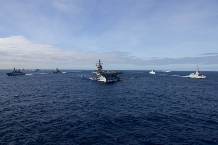 The first-in-class aircraft carrier USS Gerald R. Ford (CVN 78) steams in the Atlantic Ocean in formation with the German frigate FGS Hessen (F 221), Ticonderoga-class guided-missile cruiser USS Normandy (CG 60), Danish frigate HDMS Peter Willemoes (FFH 362), Canadian frigate HMCS Montreal (FFH 336), Arleigh Burke-class guided-missile destroyer USS Thomas Hudner (DDG 116), Spanish Armada frigate Álvaro de Bazán (F 101), Dutch frigate HNLMS De Zeven Provincien (F 802), French frigate FS Chevalier Paul (D 621), Dutch frigate HNLMS Van Amstel (F 831) and Arleigh Burke-class guided-missile destroyer USS McFaul (DDG 74), Nov. 7, 2022. Exercise Silent Wolverine is a U.S.-led, combined training exercise that tests Ford-class aircraft carrier capabilities through integrated high-end naval warfare scenarios alongside participating allies in the Eastern Atlantic Ocean. The Gerald R. Ford Carrier Strike Group is conducting their first deployment in the U.S. Naval Forces Europe area of operations. (U.S. Navy photo by Mass Communication Specialist 3rd Class Jacob Mattingly)
