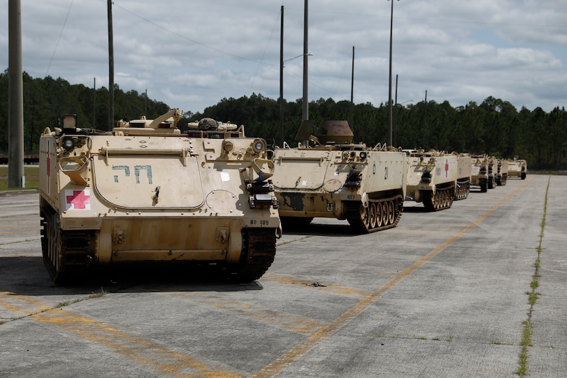 Armored vehicles in line before being shipped.