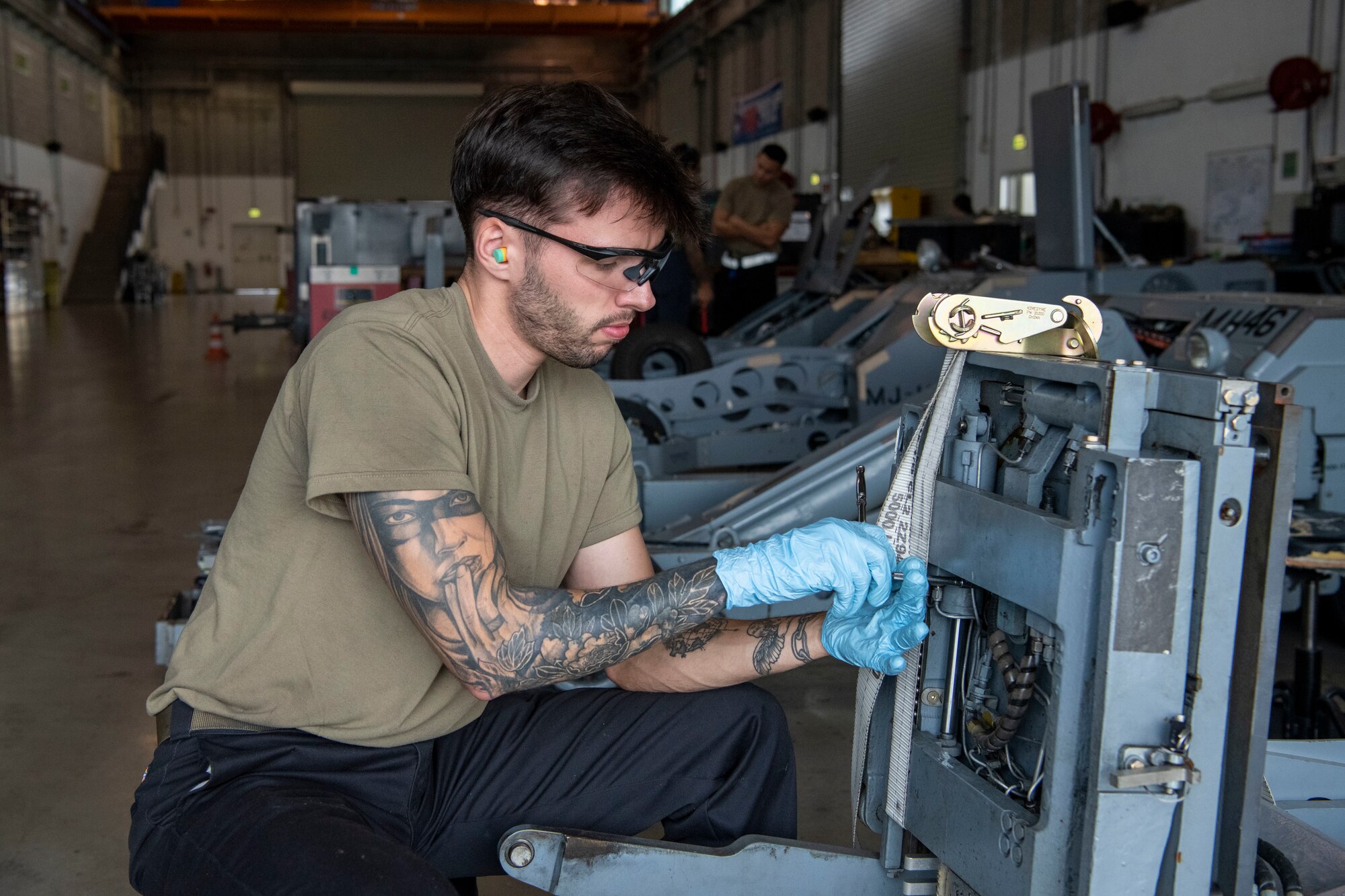 Senior Airman Devin Goodspeed, 31st Maintenance Squadron Aerospace Ground Equipment journeyman, maintains a bomb lift at Aviano Air Base, Italy, Oct. 24, 2022. The bomb lifts area a vital component at fighter wings as because they aid in the transport and loading of munitions onto fighter aircraft. (U.S. Air Force photo by Airman 1st Class Thomas Calopedis)