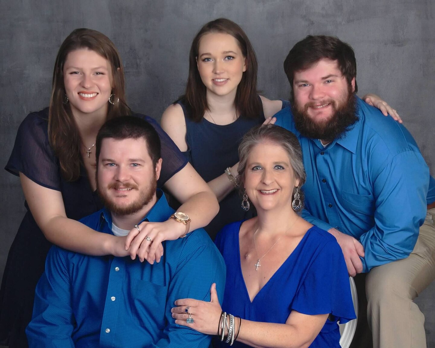 Tina Gatewood, Mobile District customer service representative, bottom right, poses with her family for a recent family portrait Oct. 8, 2022, Mobile, Alabama. Gatewood, who was diagnosed with Stage IV colon cancer in May of 2021, still ensures the payroll is met for the District’s over 1,500 employees. (Courtesy photo)