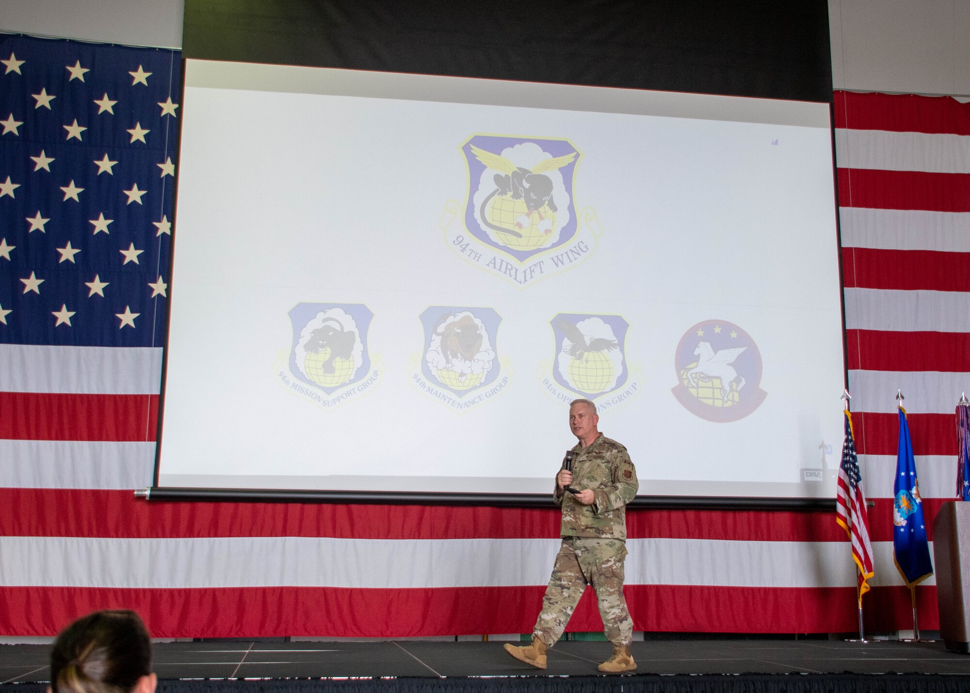 Col. Magnusson stands on state during an all-call.