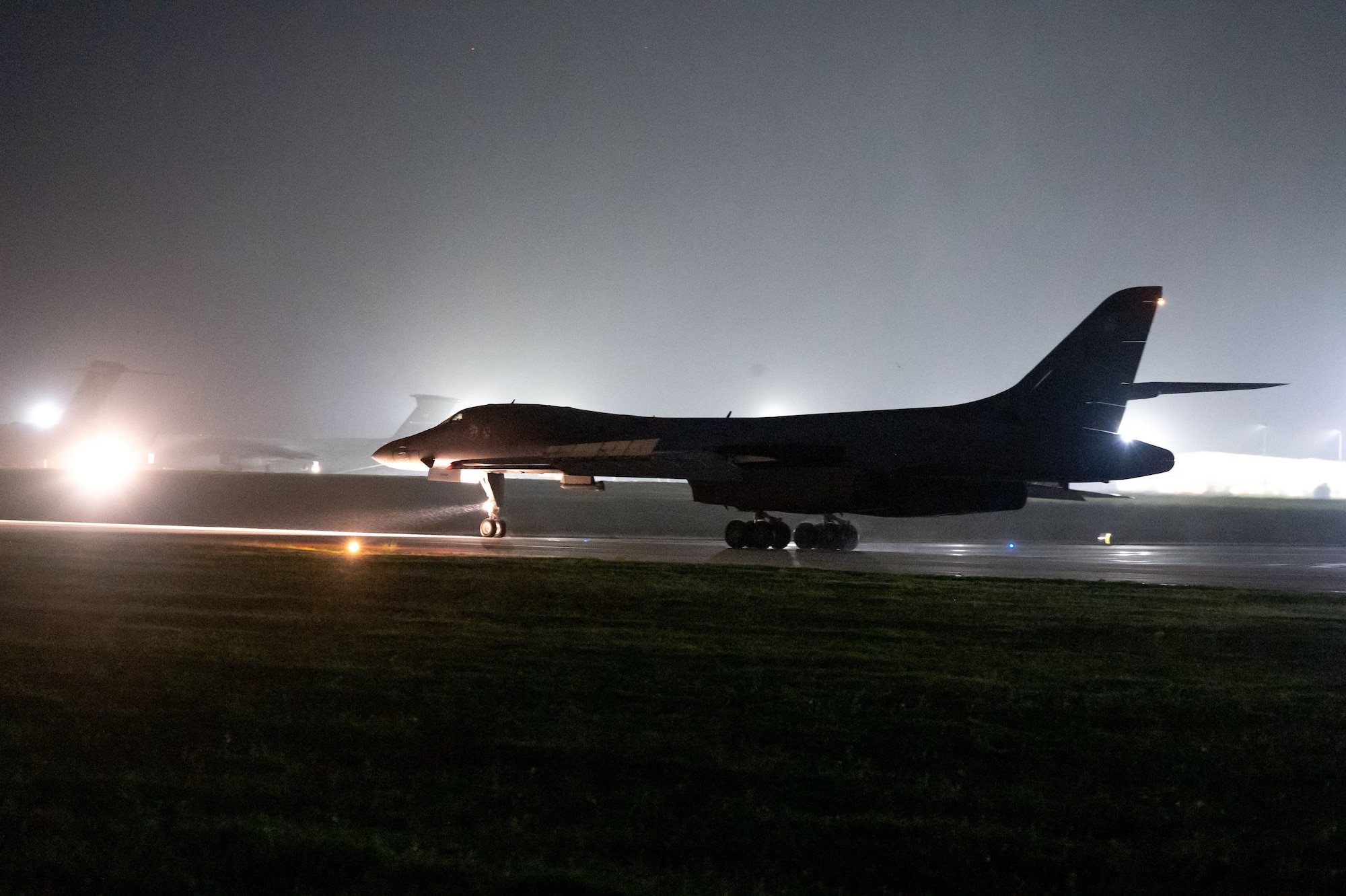 A U.S. Air Force B-1B Lancer assigned to the 37th Expeditionary Bomb Squadron, Ellsworth Air Force Base, South Dakota, lands at Andersen AFB, Guam, after a Bomber Task Force mission, Nov. 5, 2022. BTF missions are designed to showcase Pacific Air Force’s ability to deter, deny and dominate any influence or aggression from adversaries or competitors. (U.S. Air Force photo by Staff Sgt. Hannah Malone)