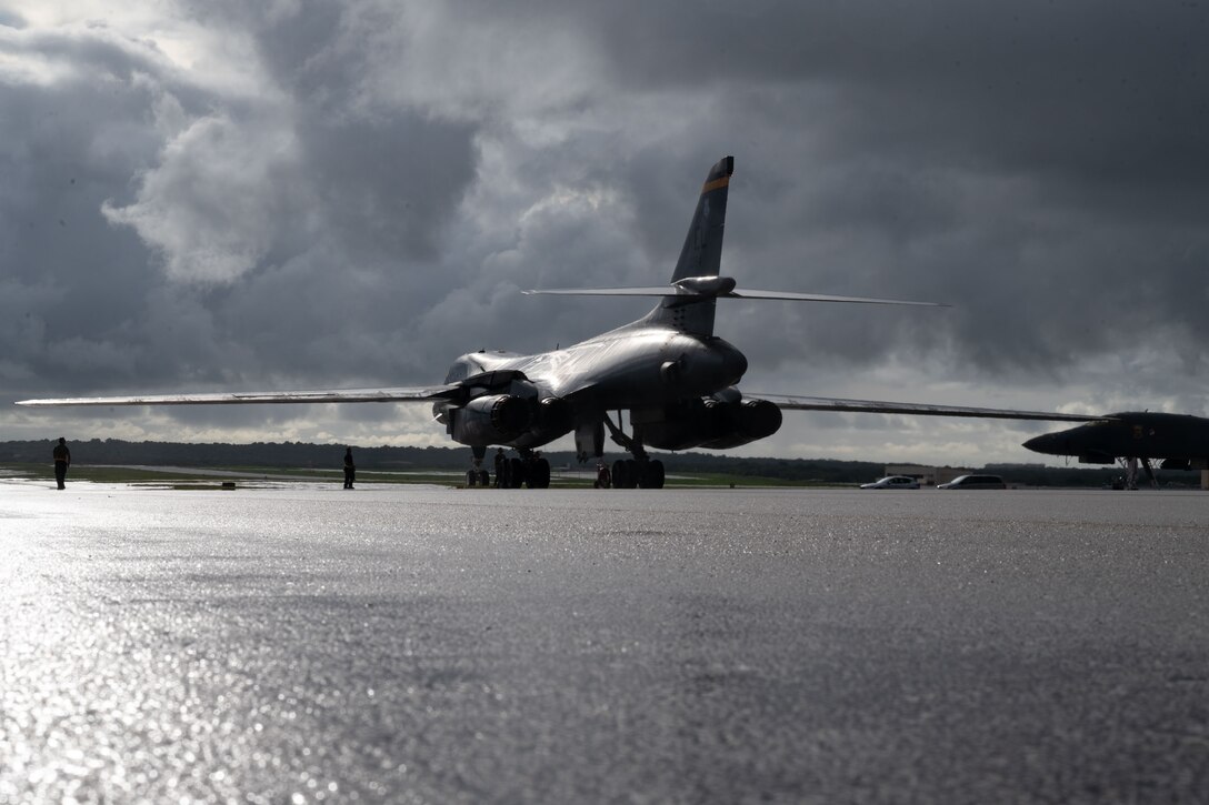 A U.S. Air Force B-1B Lancer assigned to the 37th Expeditionary Bomb Squadron, Ellsworth Air Force Base, South Dakota, prepares to park after Bomber Task Force mission at Andersen AFB, Guam, Nov. 4, 2022. BTF missions provide opportunities to train and work with alongside Allies and partners in joint and coalition operations and exercises. (U.S. Air Force photo by Staff Sgt. Hannah Malone)