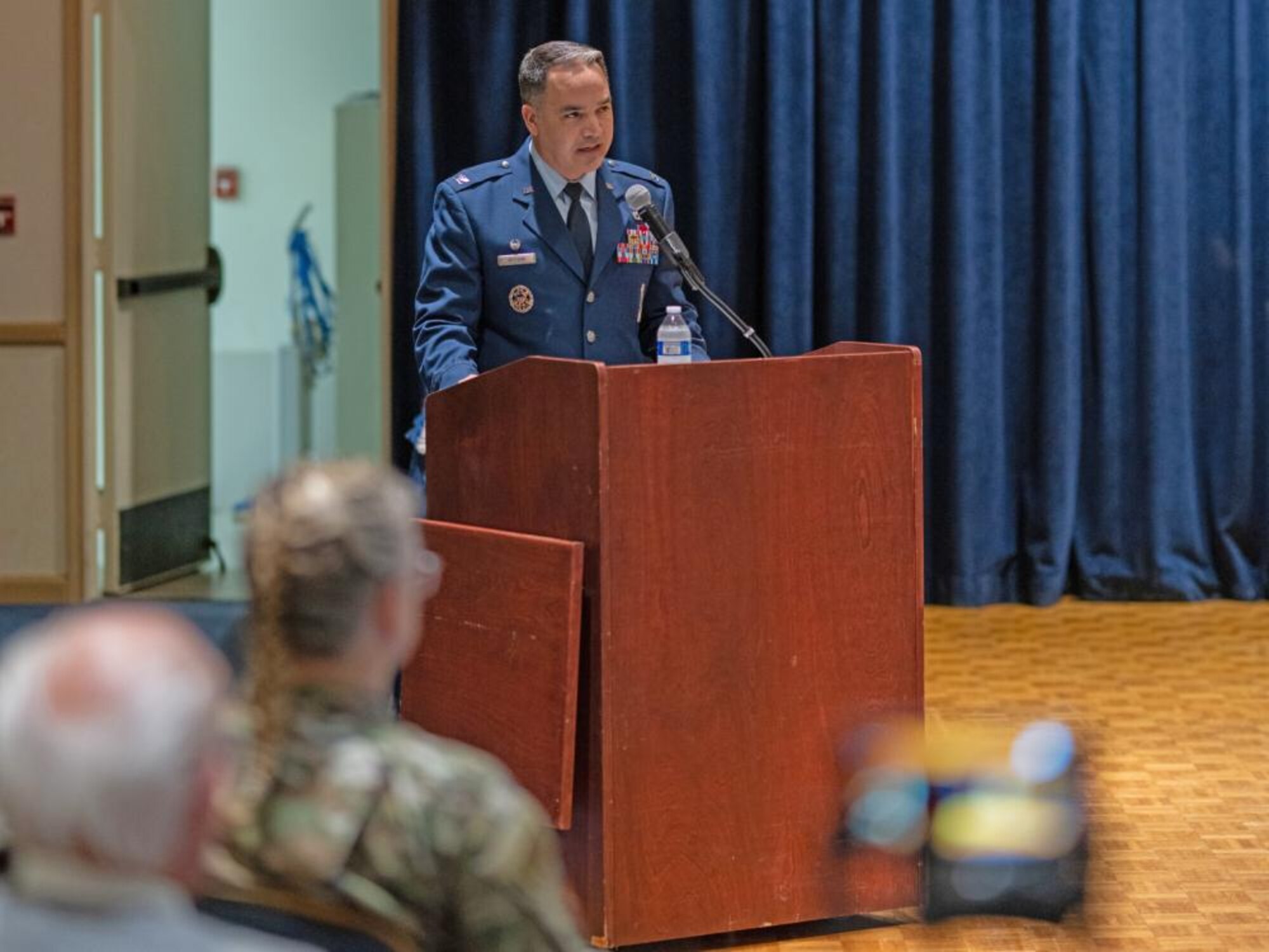 Air Force officer speaks to crowd.