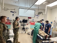 Soldiers with 2nd General Aviation Support Battalion, 211th Aviation Regiment transport patients on a UH-60 Black Hawk helicopter to the Riverton Hospital helicopter pad to be treated at the emergency room.