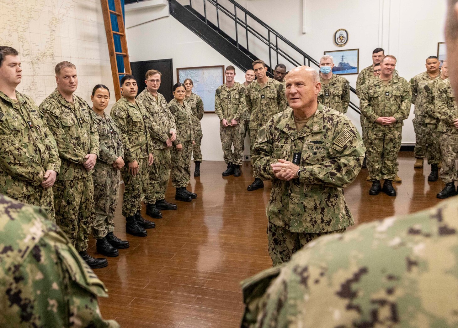 YOKOSUKA, Japan (Nov. 7, 2022) Chief of Naval Operations (CNO) Adm. Mike Gilday addresses Sailors assigned to Arleigh Burke-class guided-missile destroyers USS Barry (DDG 52), USS Milius (DDG 69) and USS Ralph Johnson (DDG 114) and Sailors assigned to Commander, Task Force (CTF) 71 after a group reenlistment at the CTF 71 command cave, in Yokosuka, Japan, Nov. 7. Commander, Task Force 71/Destroyer Squadron (DESRON) 15 is the Navy’s largest forward-deployed DESRON and the U.S. 7th Fleet’s principal surface force. (U.S. Navy photo by Mass Communication Specialist 1st Class Deanna C. Gonzales)