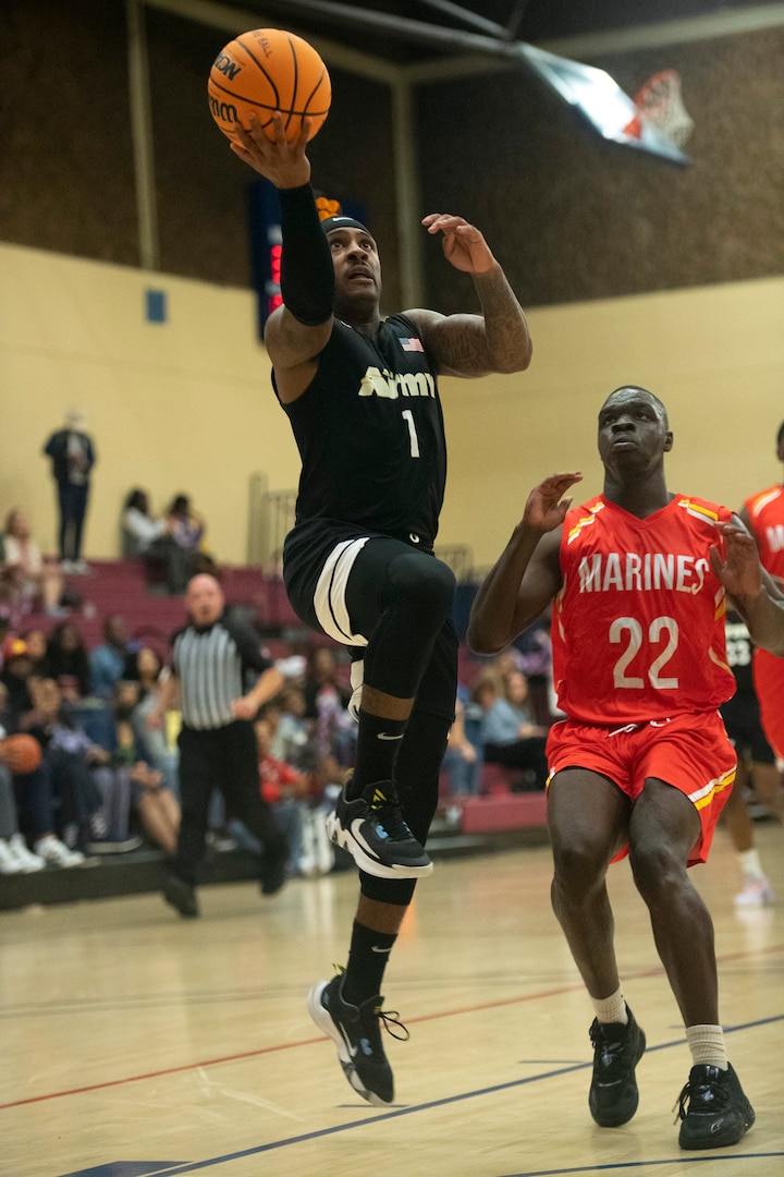 Army 1st Lt. Freddie Nichols lays up a shot during the 2022 Armed Forces Men’s and Women’s Basketball  at Naval Base San Diego, in San Diego, Calif. Nov. 5, 2022. The 2022 Armed Forces Men’s and Women’s Basketball Championships held at the Admiral Prout Fieldhouse on Naval Base San Diego, California from 5-13 November 2022. (DoD photo by EJ Hersom)