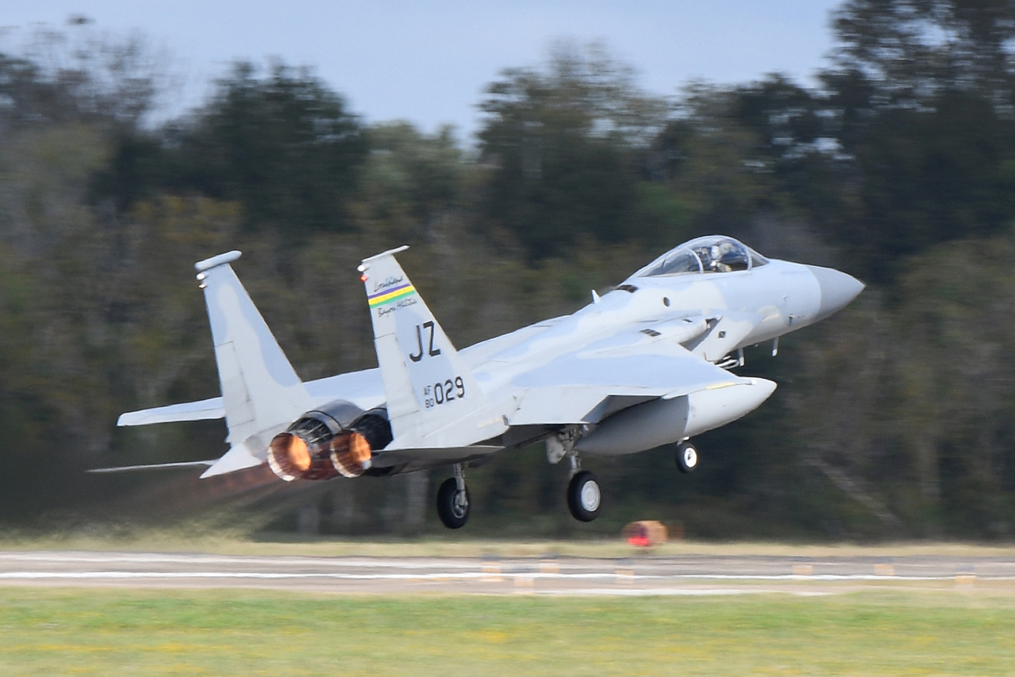 An F-15C Eagle takes off during a readiness exercise at Naval Air Station Joint Reserve Base New Orleans, Nov. 6, 2022. The exercise included 13 Boeing F-15Cs launching to participate in a training exercise with seven other aircraft over the Gulf of Mexico.