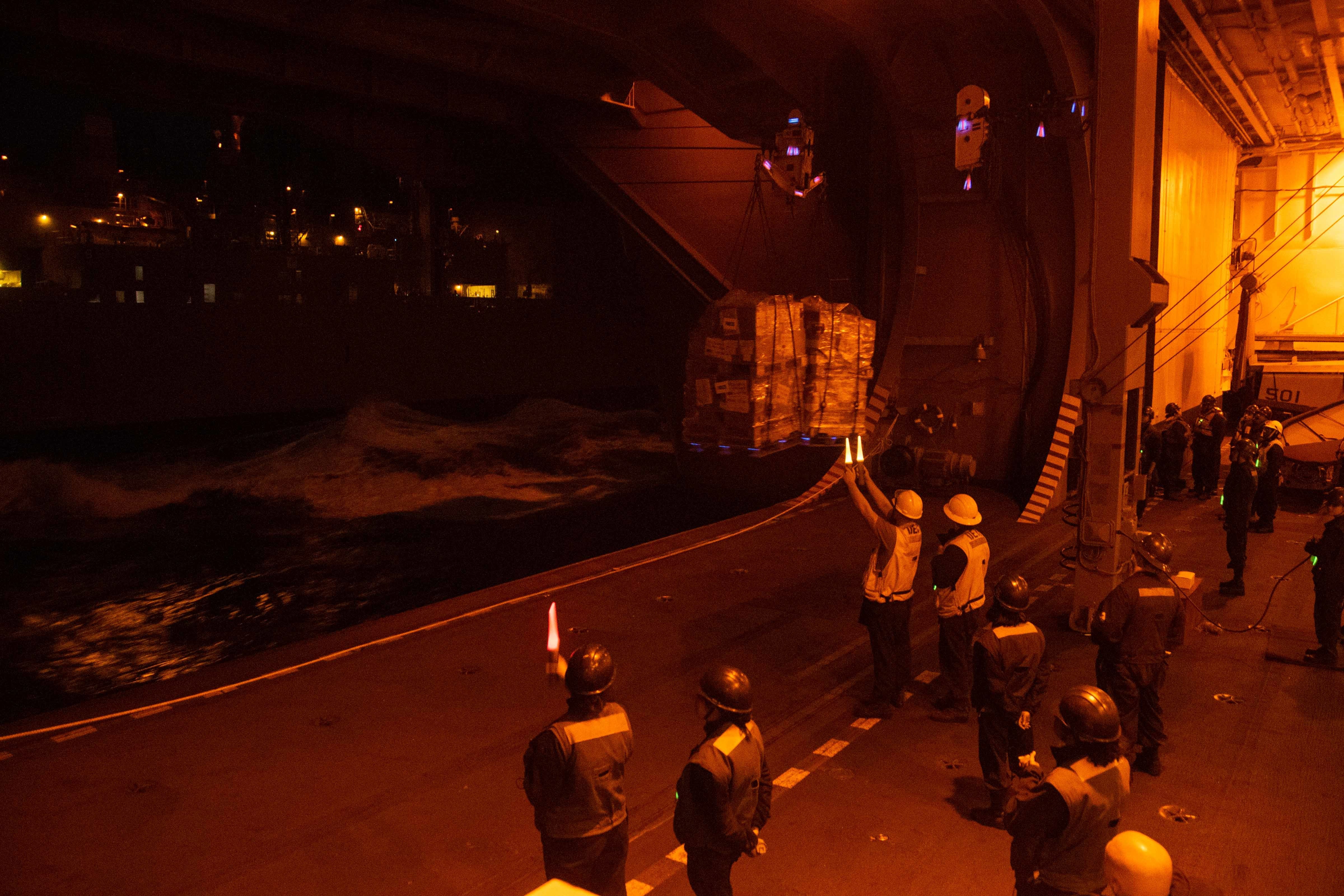 USS Ronald Reagan (CVN 76) replenishes from USNS Carl Brashear (T-AKE 7).