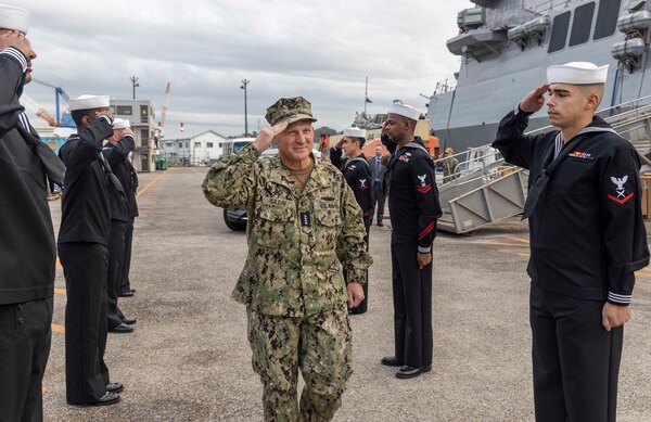 YOKOSUKA, Japan (Nov. 7, 2022) Chief of Naval Operations (CNO) Adm. Mike Gilday salutes as he passes through sideboys while visiting Arleigh Burke-class guided-missile destroyer USS Rafael Peralta (DDG 115) moored at Commander, Fleet Activities Yokosuka, Nov. 7. Rafael Peralta is assigned to Commander, Task Force 71/Destroyer Squadron (DESRON) 15, the Navy’s largest forward-deployed DESRON and the U.S. 7th Fleet’s principal surface force. (U.S. Navy photo by Mass Communication Specialist 1st Class Deanna C. Gonzales)