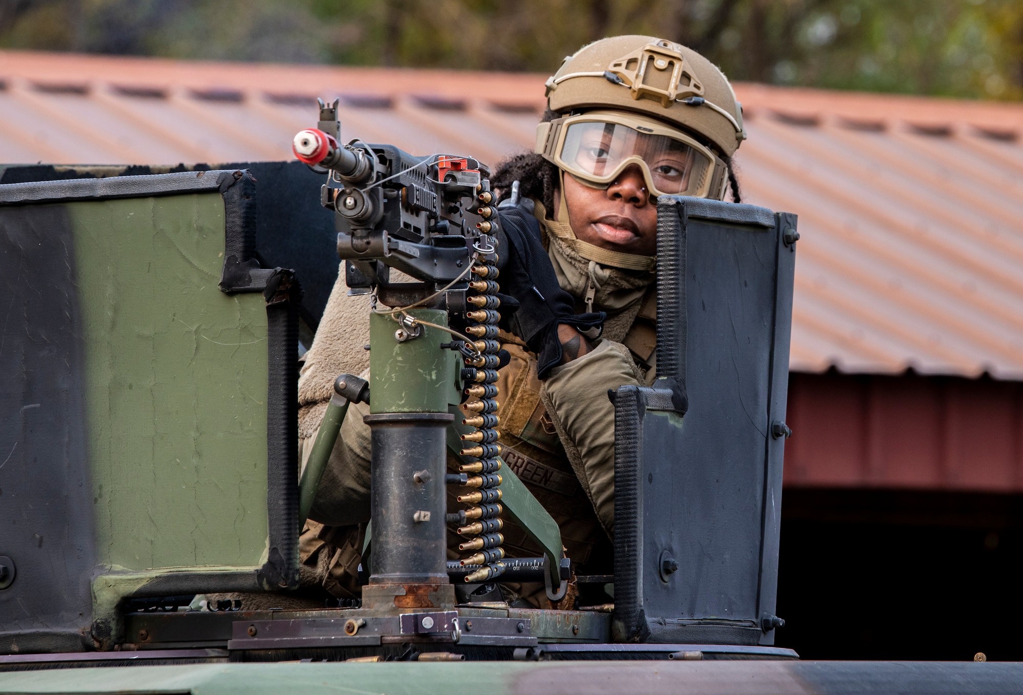 U.S. Air Force Airman Antoiniece Green, 51st Security Forces Squadron response force, watches for threats in the turret of a Humvee during a joint Combat Readiness Course with Republic of Korea Military Police members at Osan Air Base, ROK, Nov. 3, 2022.