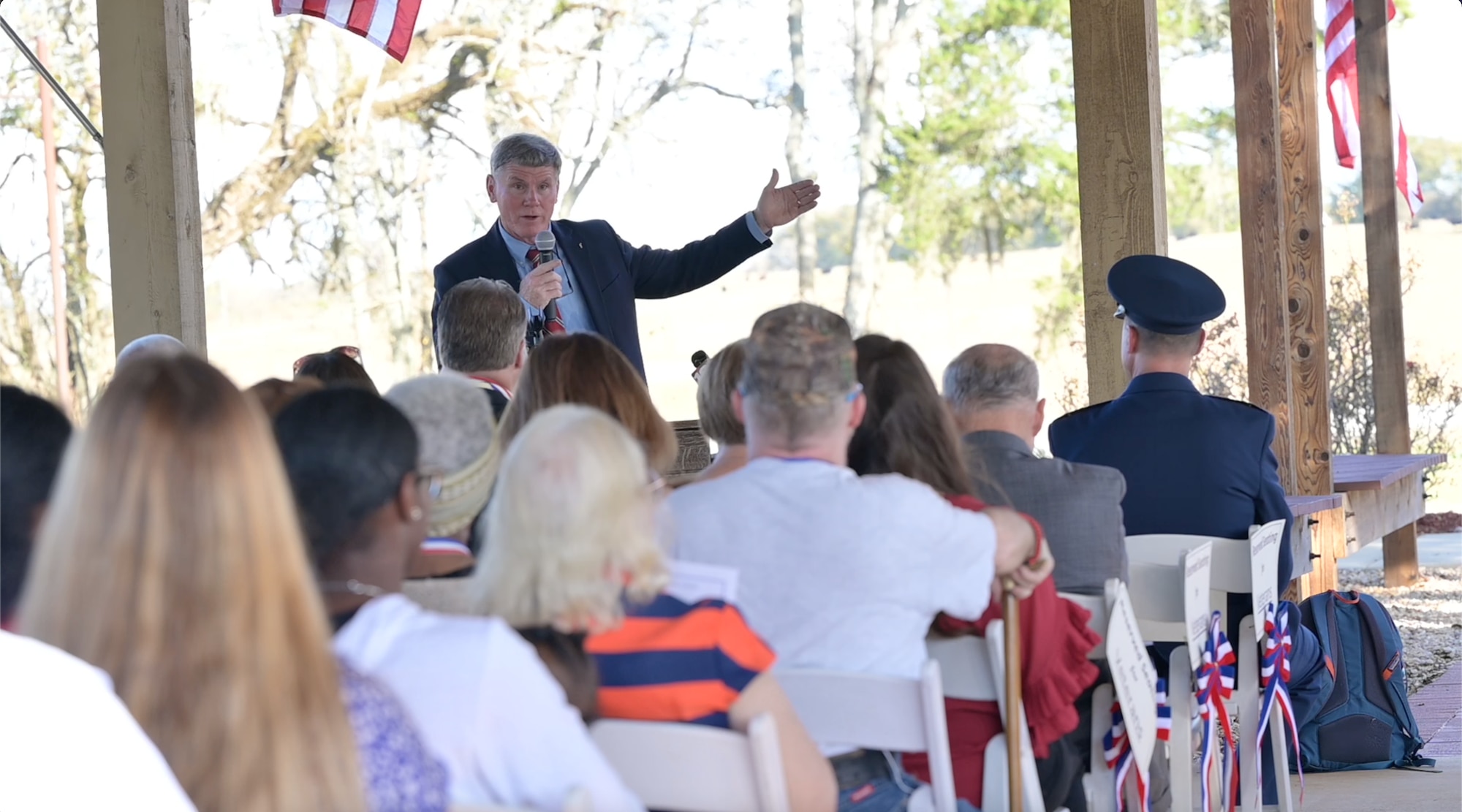 a man speaks to a crowd