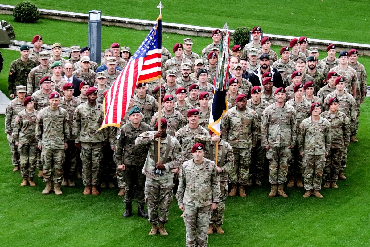 A group of soldiers pose for a photo.