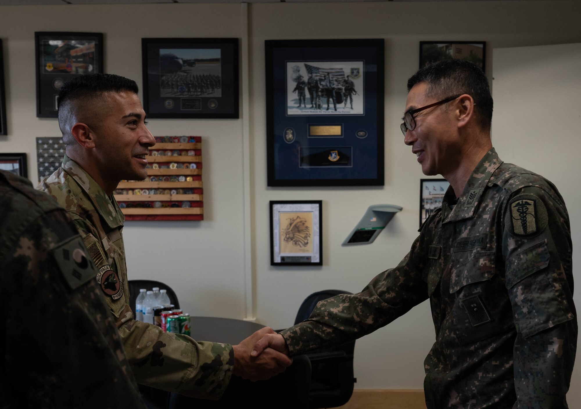 Chief Master Sgt. Carlos Damian, 8th Fighter Wing command chief (left), greets Republic of Korea Army 35th Infantry Division Command Sergeant Major Kwang-ho Ryu after an 8th Maintenance Group immersion tour at Kunsan Air Base, Republic of Korea, Nov. 8, 2022. The two leaders had the opportunity to discuss the ROK-U.S.’s strong alliance and plan development opportunities in the future. (U.S. Air Force photo by Senior Airman Shannon Braaten)